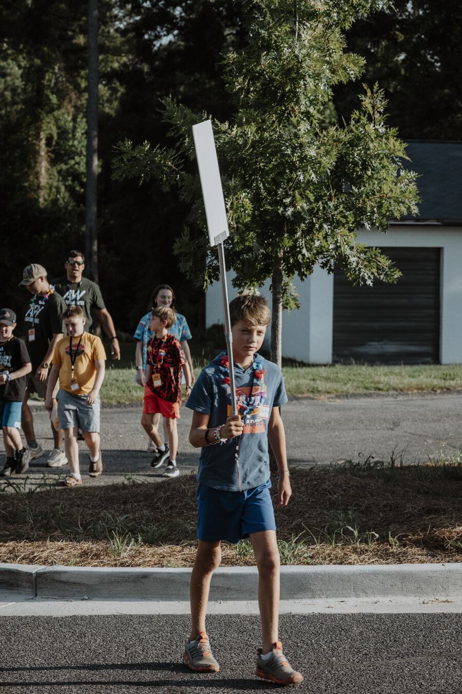 A child walking outside.