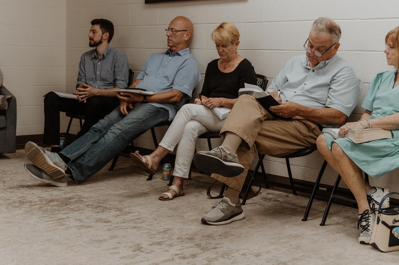 A circle of chairs pulled together for a study.
