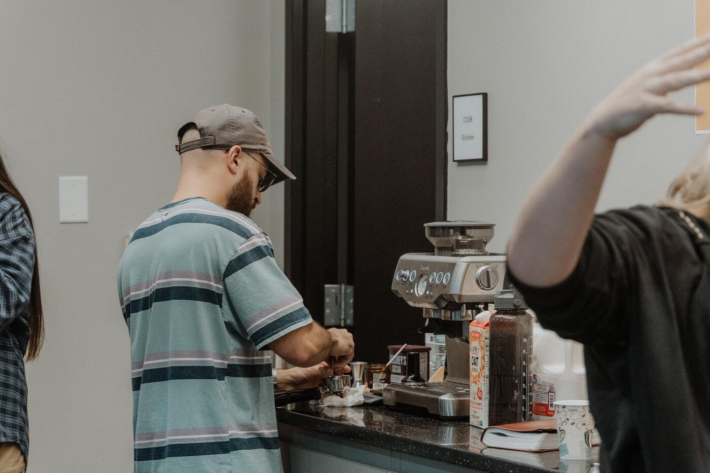 Ordering at the coffee bar before the evening starts.