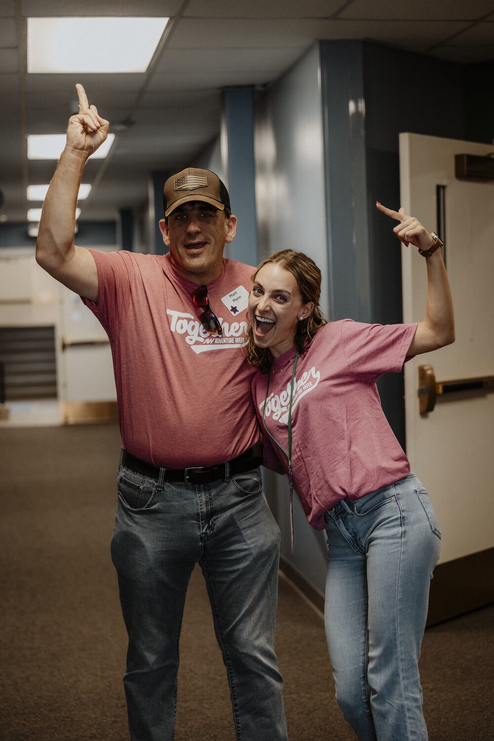 Two volunteers cheering.