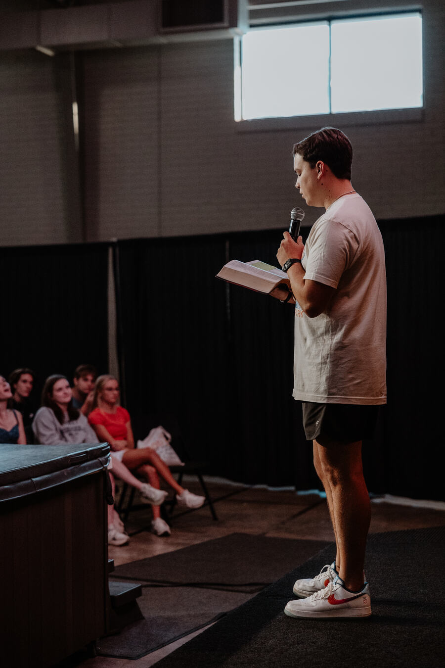 Teaching to a room of students.