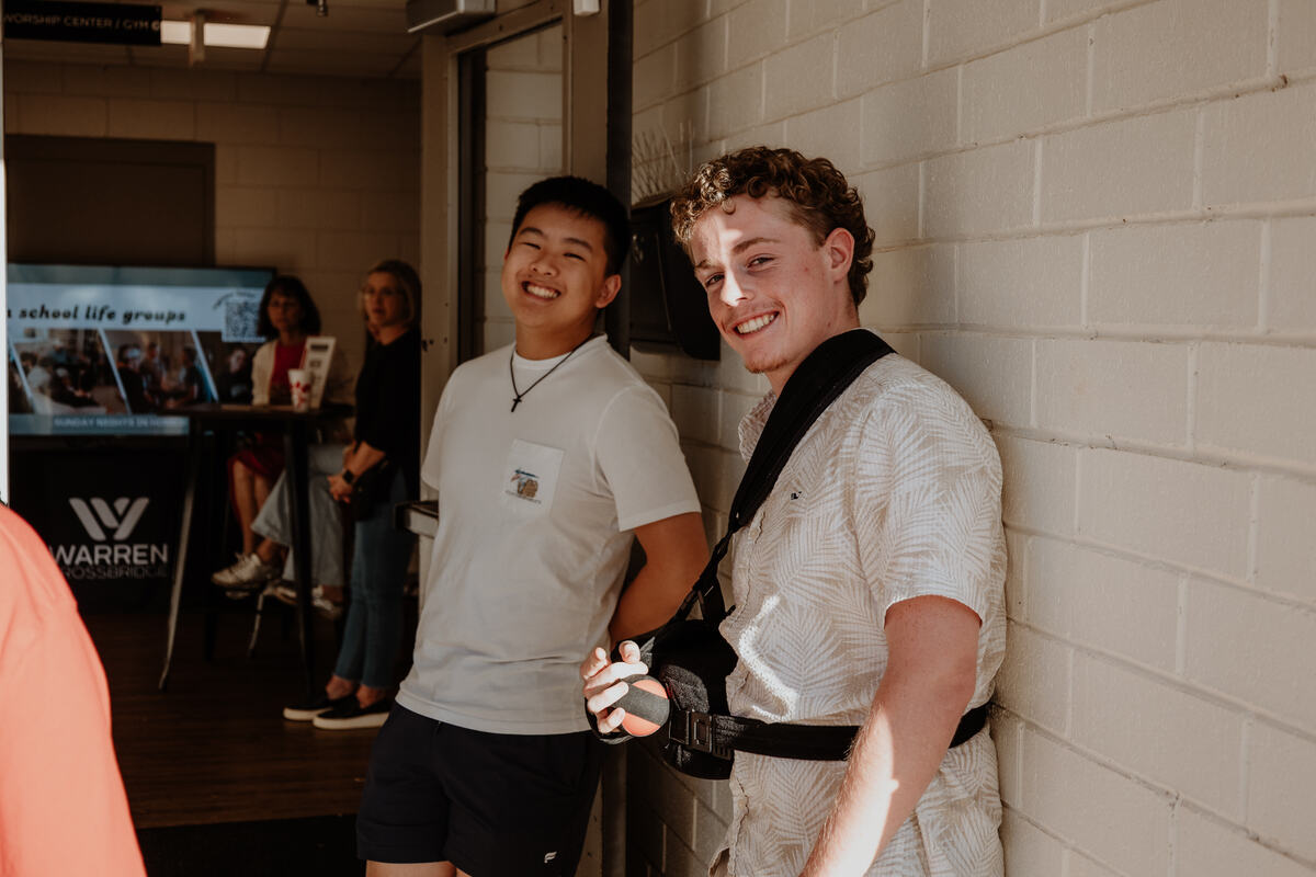 Two students standing together.