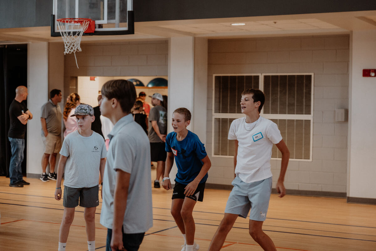 Students crossing the gym.