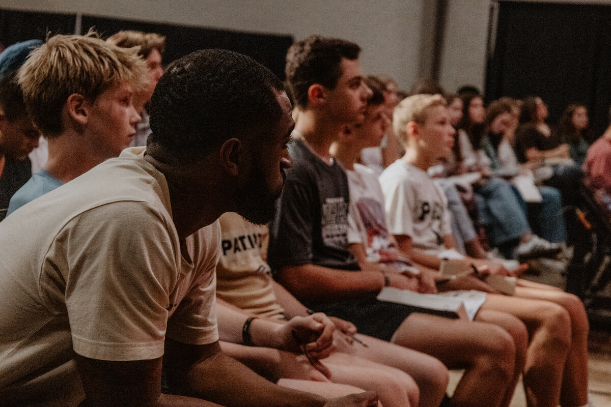 Students seated together, listening.
