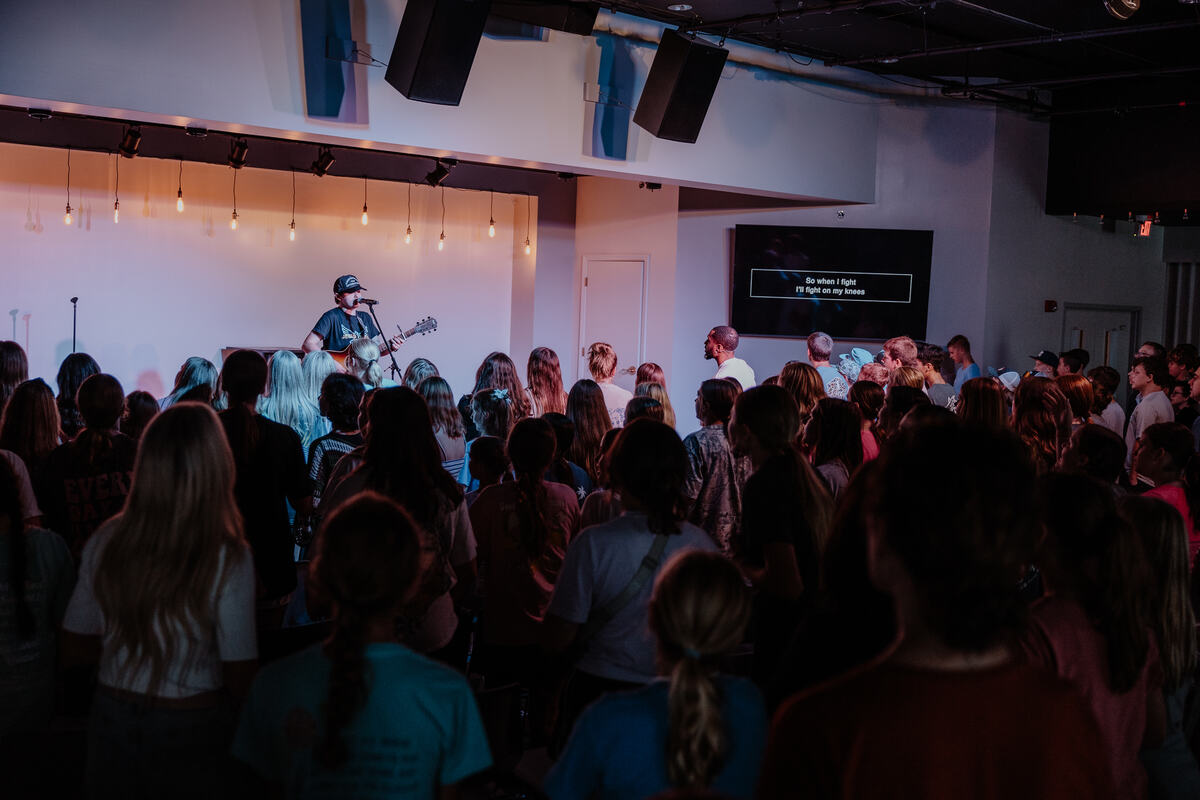 Students singing together.