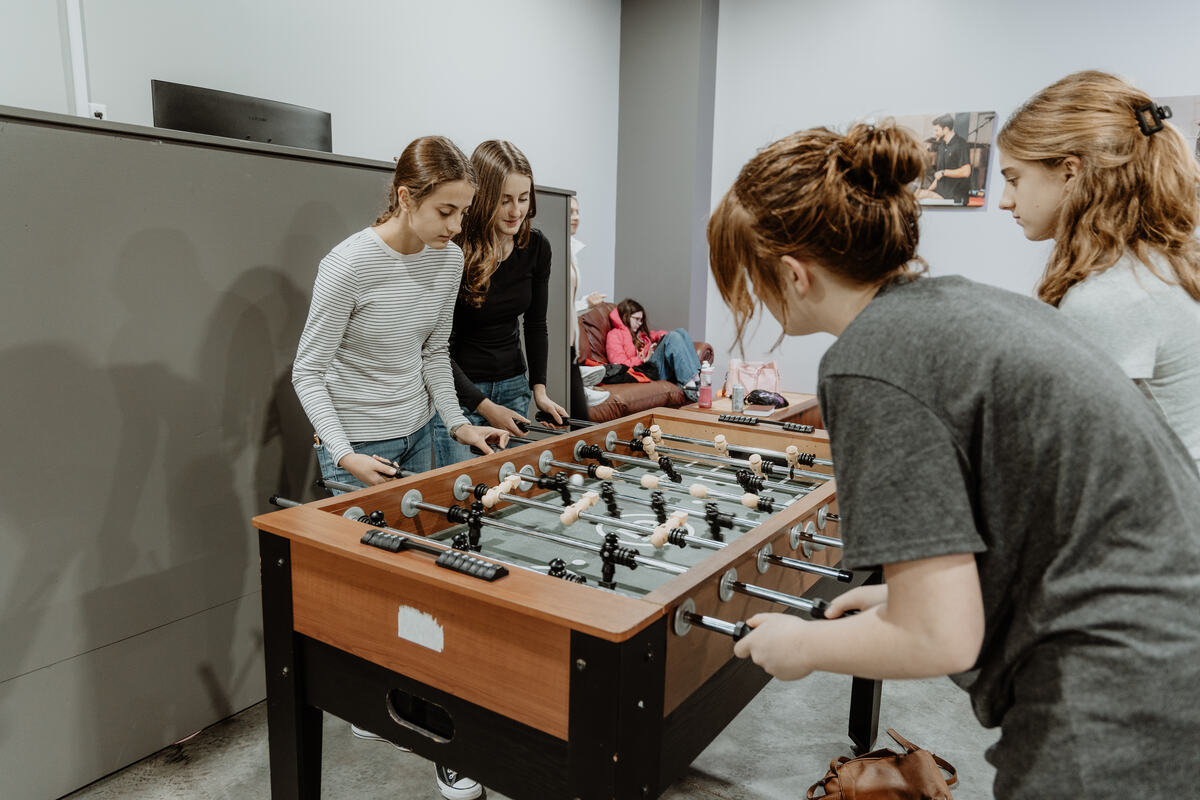 A game of foosball before the night starts.