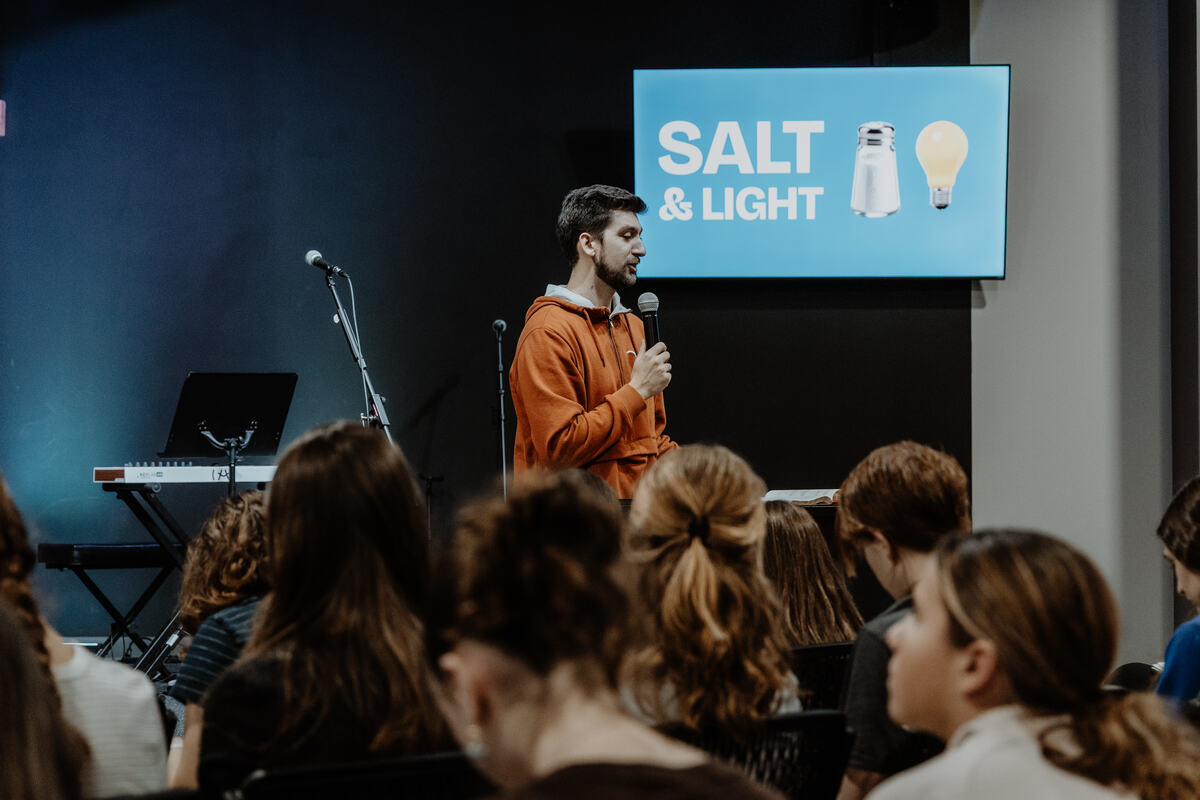 Teaching to a room of students.