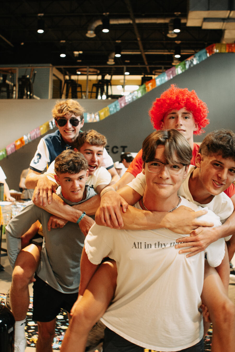 Students piled together for a photo.