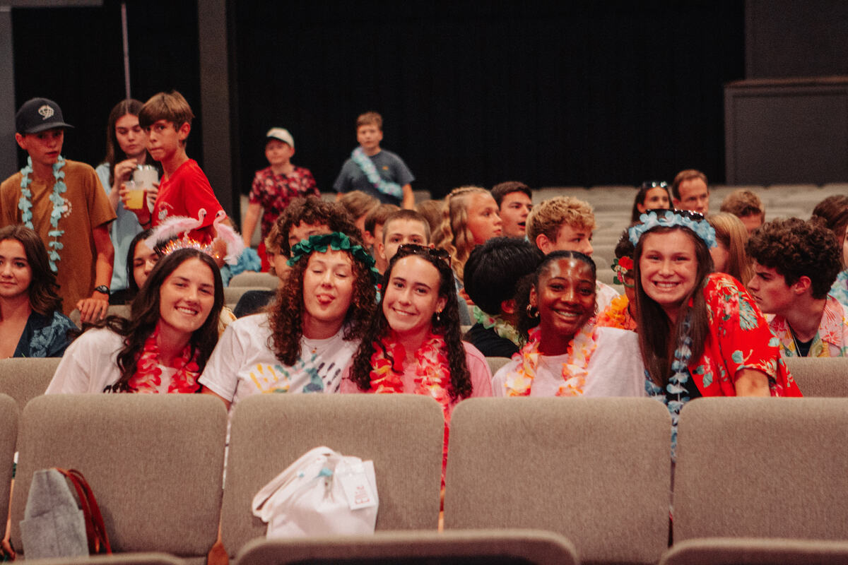 Rows of students in themed outfits.