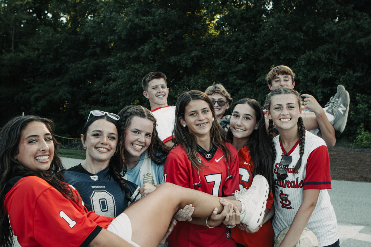 A group of students in matching jerseys.